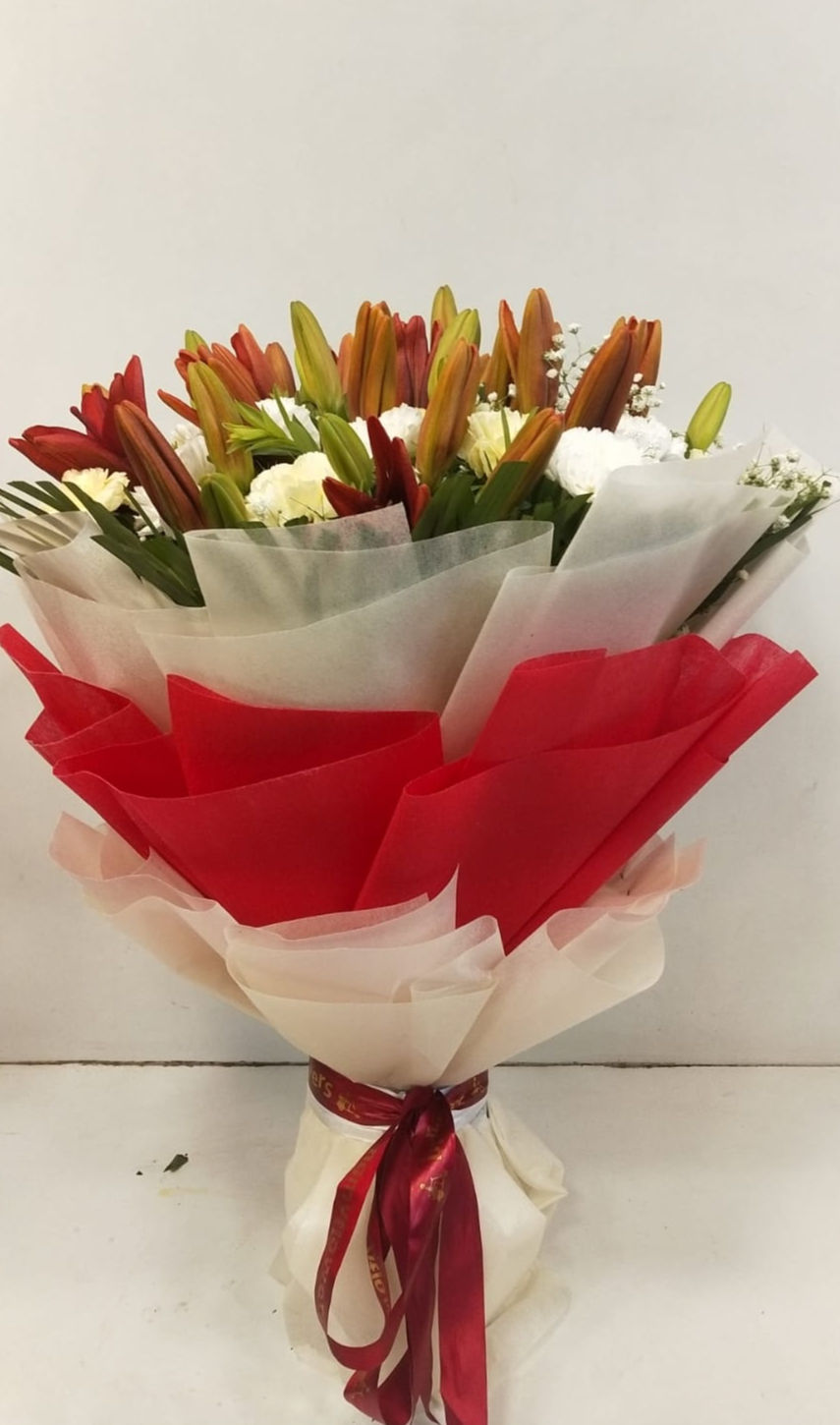 Bouquet of Asiatic Lily and Carnations in Tissue Wrap - Image 1