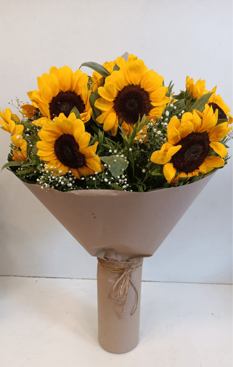 Bouquet of Sunflowers in Brown Wrap - Image 1