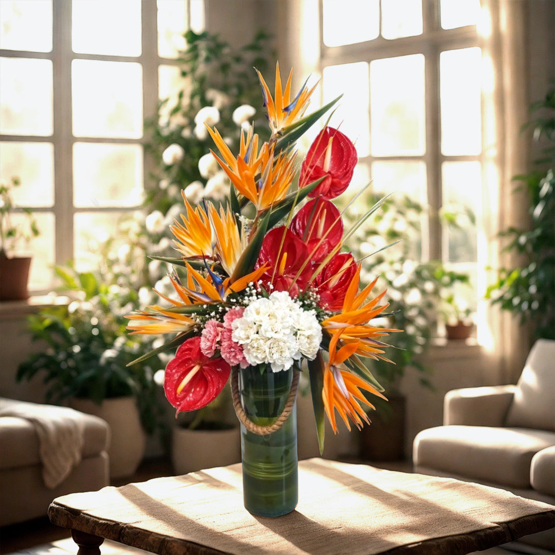 Floral Arrangement of Anthuriums, Birds of Paradise and Carnations in Glass Vase