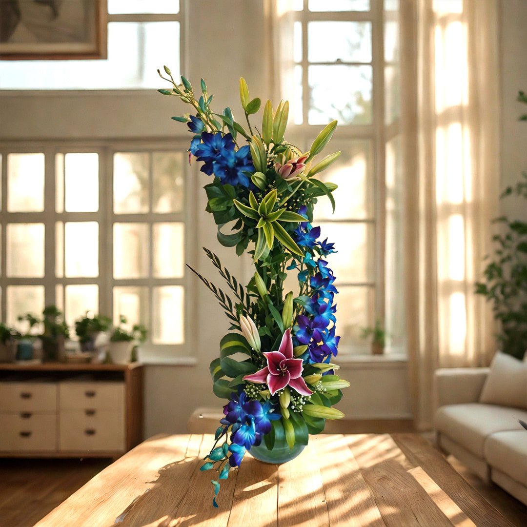 Mixed Floral Arrangement in Fish Bowl with Oriental Lilies and Orchids
