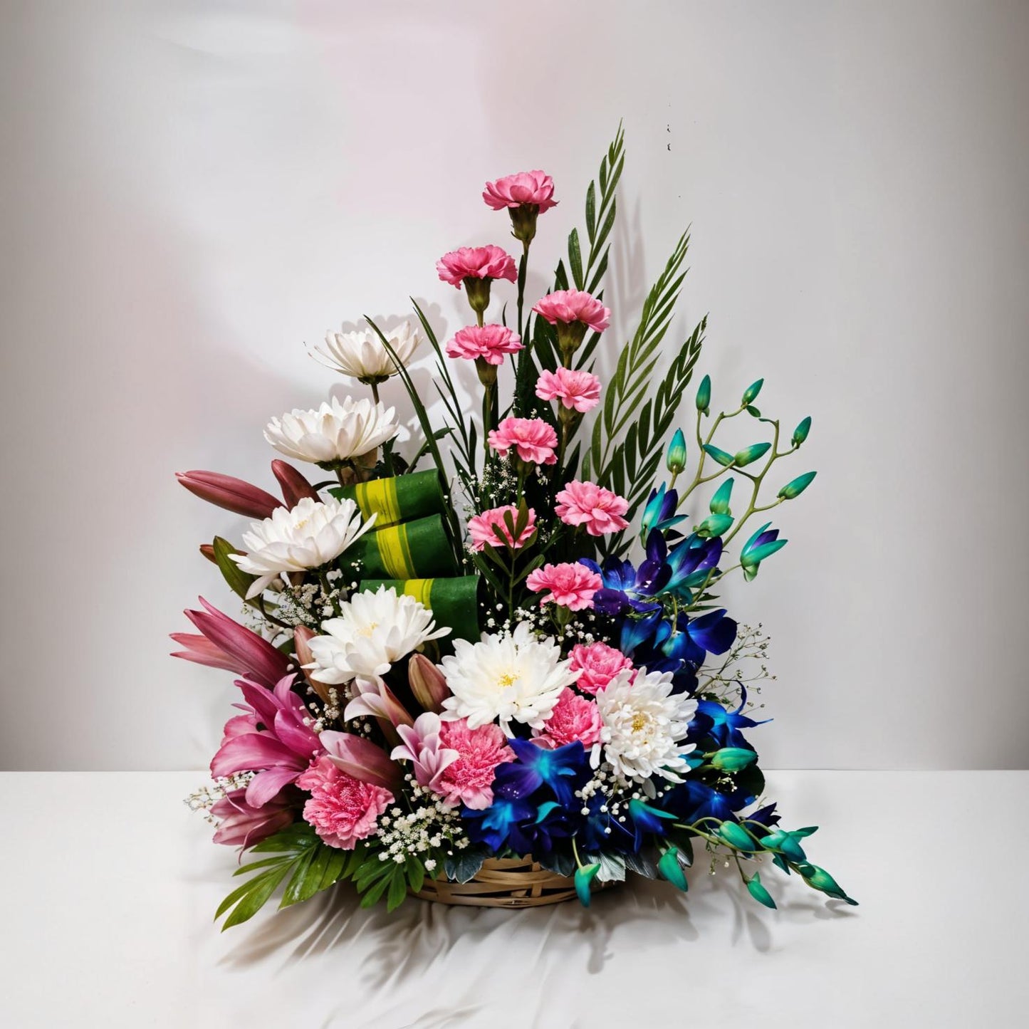 Basket Flower Arrangement of Fragrant Oriental Lily, Carnation, Guldawari/Chrysanthemum and Orchid
