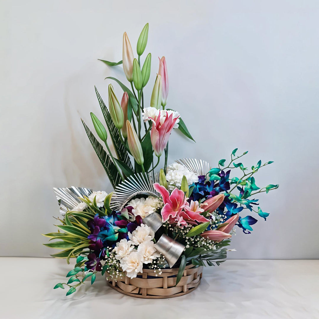 Floral Arrangement of Oriental Lilies, Carnations and Orchids in Basket