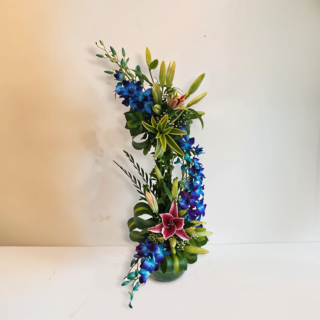 Mixed Floral Arrangement in Fish Bowl with Oriental Lilies and Orchids