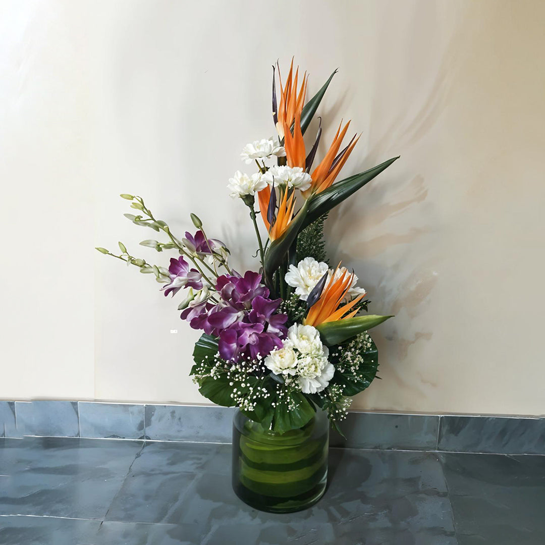 Mixed Flower Arrangement in Cylindrical Glass vase