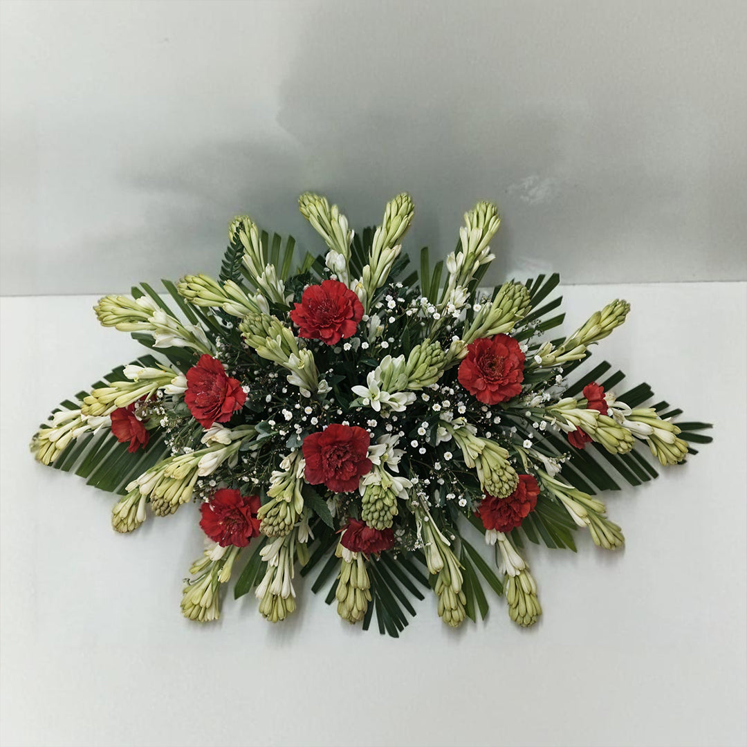 Flower Arrangement with Rajnigandha and Carnations in Glass Vase