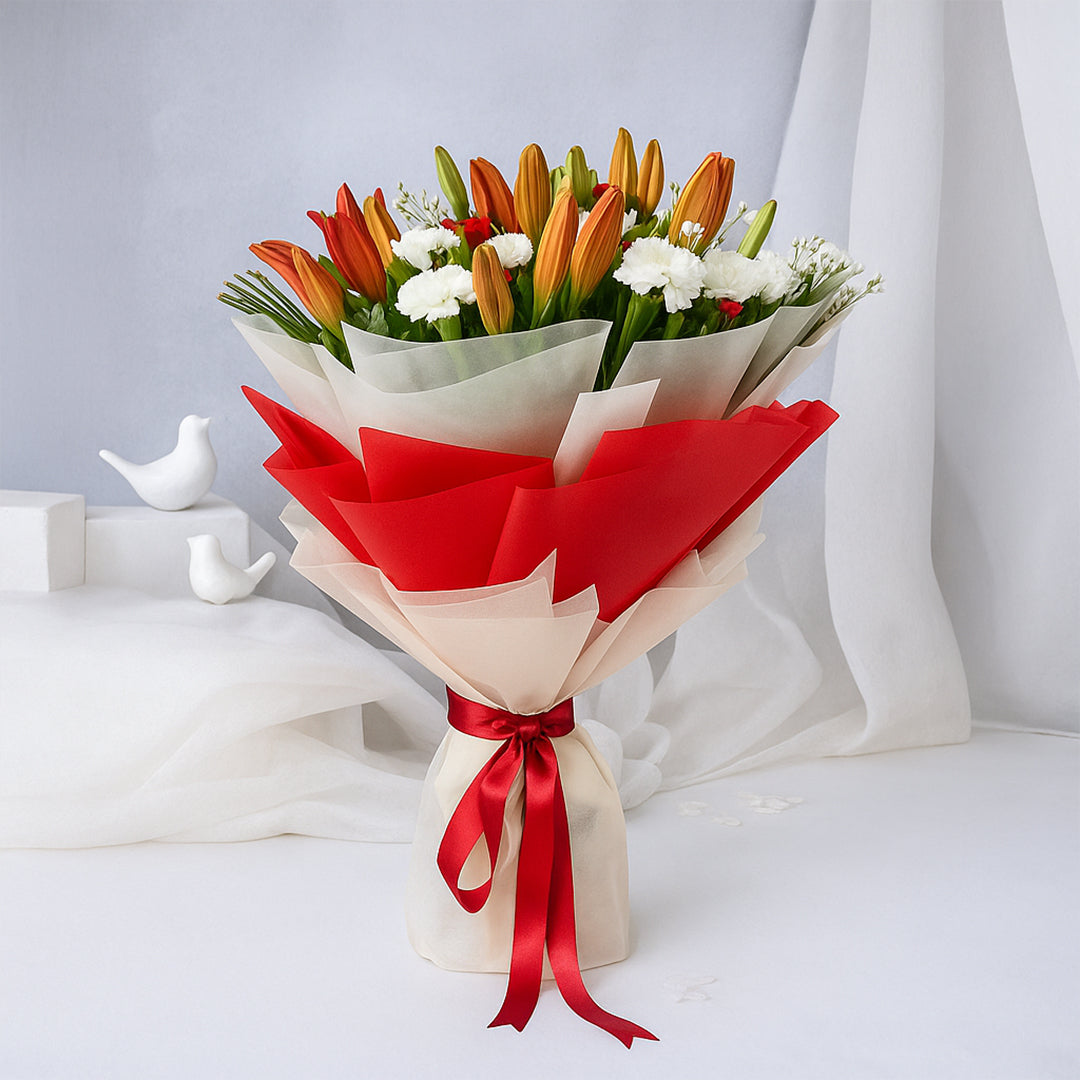 Bouquet of Asiatic Lily and Carnations in Tissue Wrap