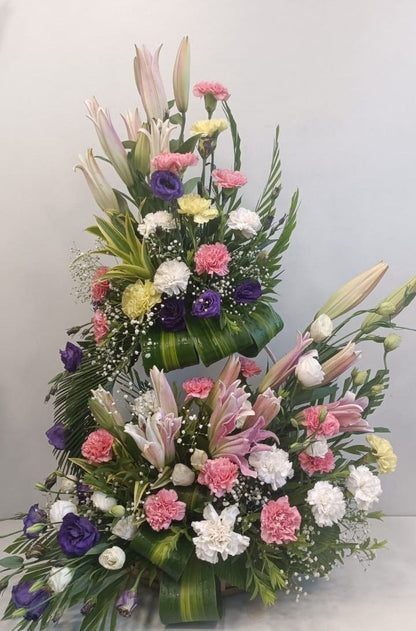 Floral Arrangement of Oriental Lilies, Eustomas and Carnations - Image 1
