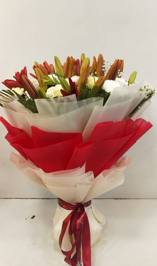 Bouquet of Asiatic Lily and Carnations in Tissue Wrap - Image 1