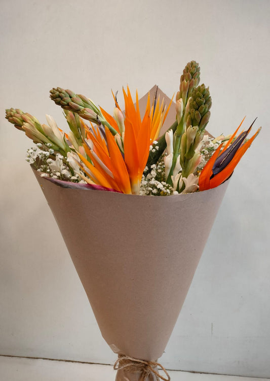 Mix of Birds of Paradise and Rajnigandha in Brown Wrap - Image 1