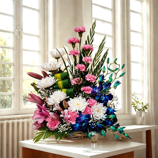 Basket Flower Arrangement of Fragrant Oriental Lily, Carnation, Guldawari/Chrysanthemum and Orchid