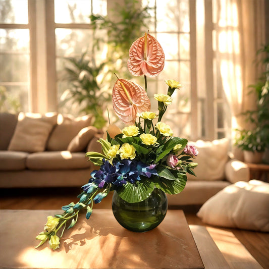 Floral Arrangement with Eustoma, Anthurium, Carnations and Orchids in Fish Bowl