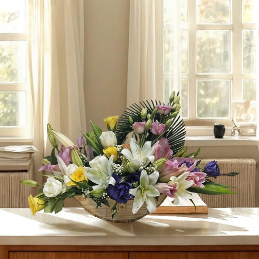 Flower Arrangement with Fragrant Oriental Lily, Eustoma and Rose in Wooden Basket
