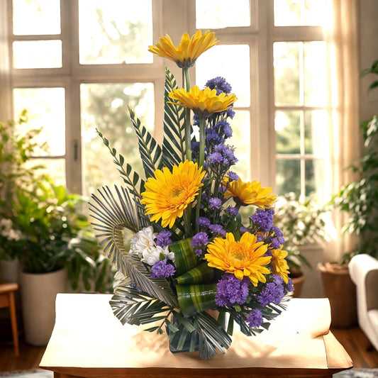 Flower Arrangement of Gerberas and Blue Daisies