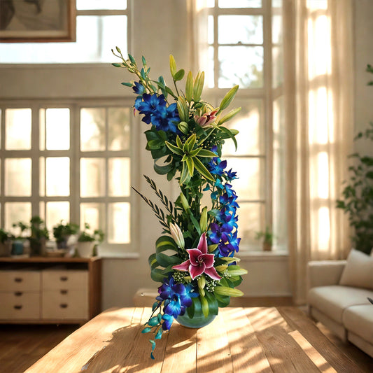 Mixed Floral Arrangement in Fish Bowl with Oriental Lilies and Orchids