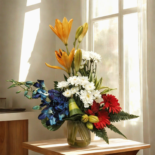 Floral Arrangement with Asiatic Lily, Spray Daisy, Gerbera and Orchids in Glass Vase
