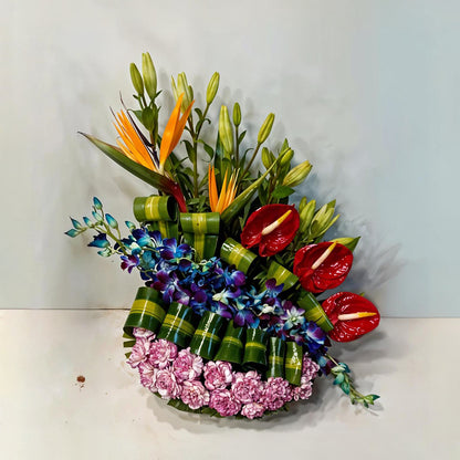 Floral Arrangement with Asiatic Lilies, Anthuriums, Carnations, Birds of Paradise and Orchids in Basket