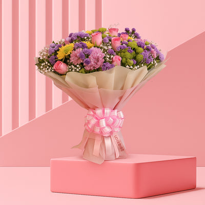 Bouquet of Roses, Mix of Spray Daisies and Blue Daisies in Tissue Wrap