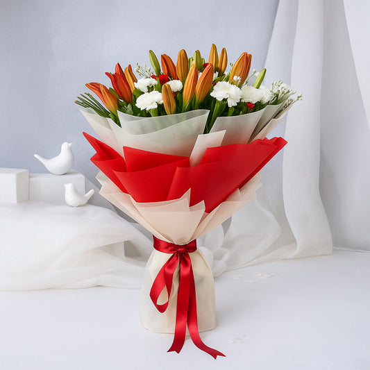 Bouquet of Asiatic Lily and Carnations in Tissue Wrap